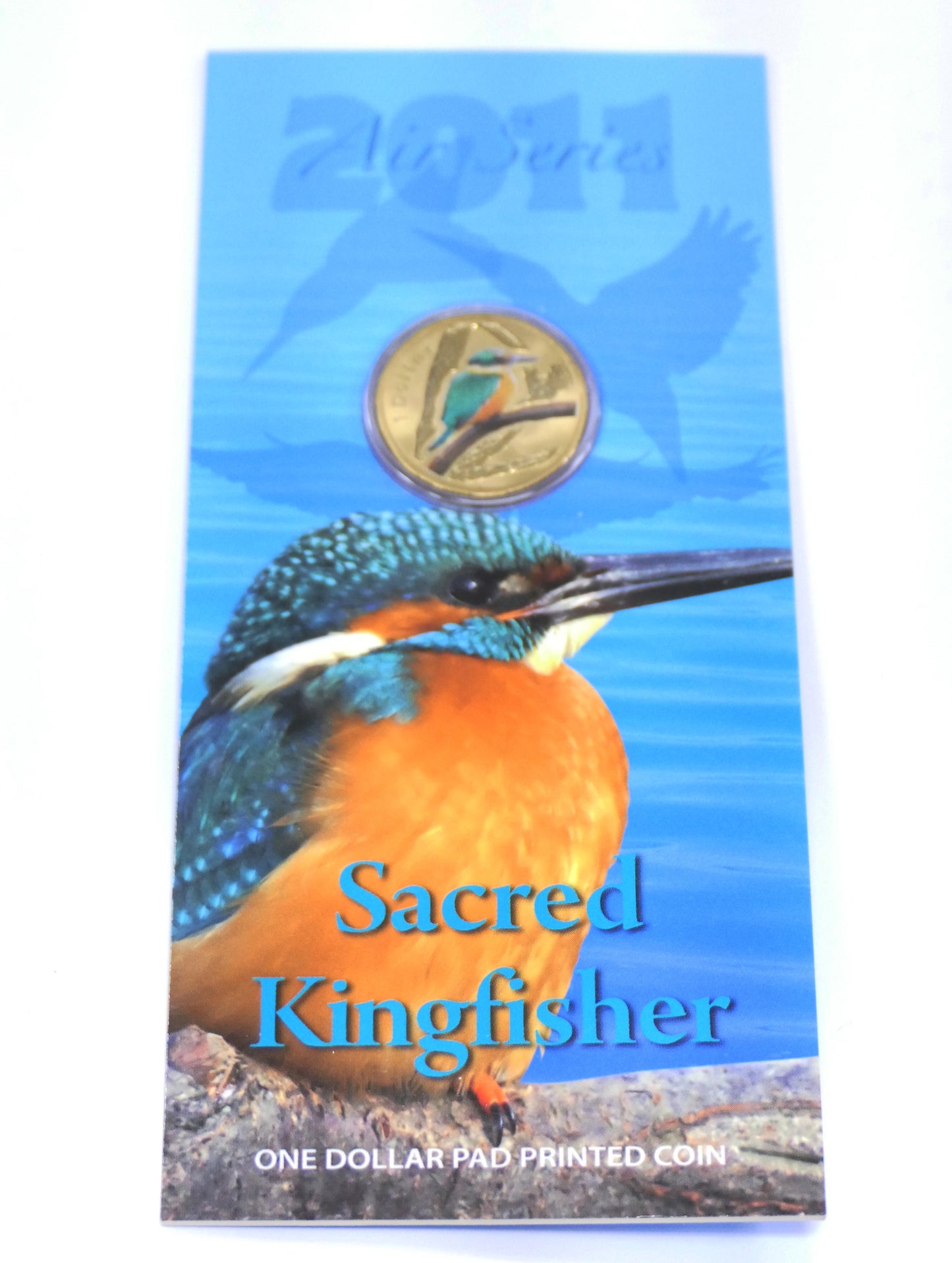 2011 Air Series: $ 1 Coloured RAM Sacred Kingfisher UNC Coin Carded Frosted front