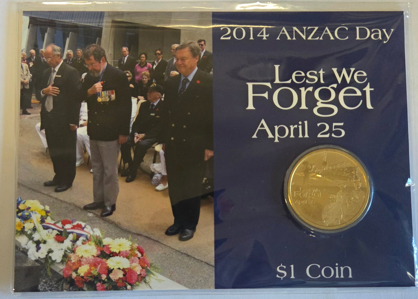 2014 ANZAC Day Lest We Forget $1 Carded Coin front