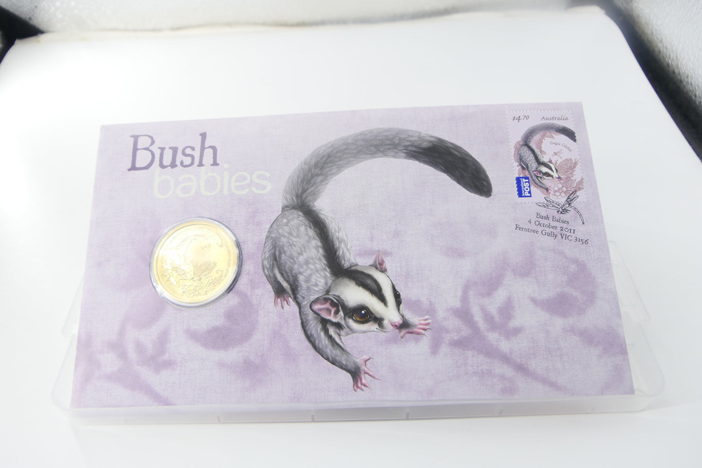 2011 Australia Post Bush Babies PNC — Sugar Glider $1 Coin front