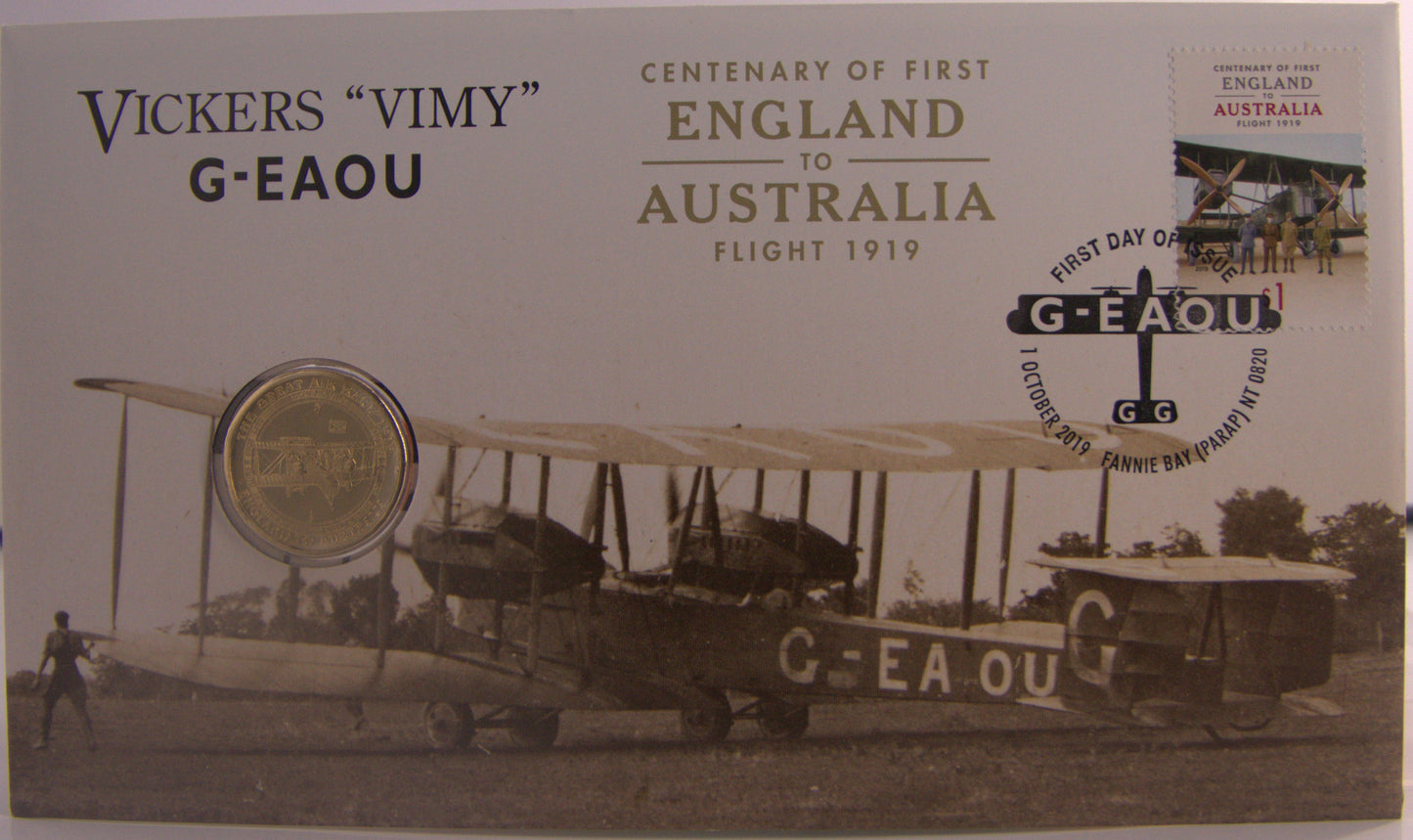 Vickers Vimy airplane and coin, commemorating the first England to Australia flight.