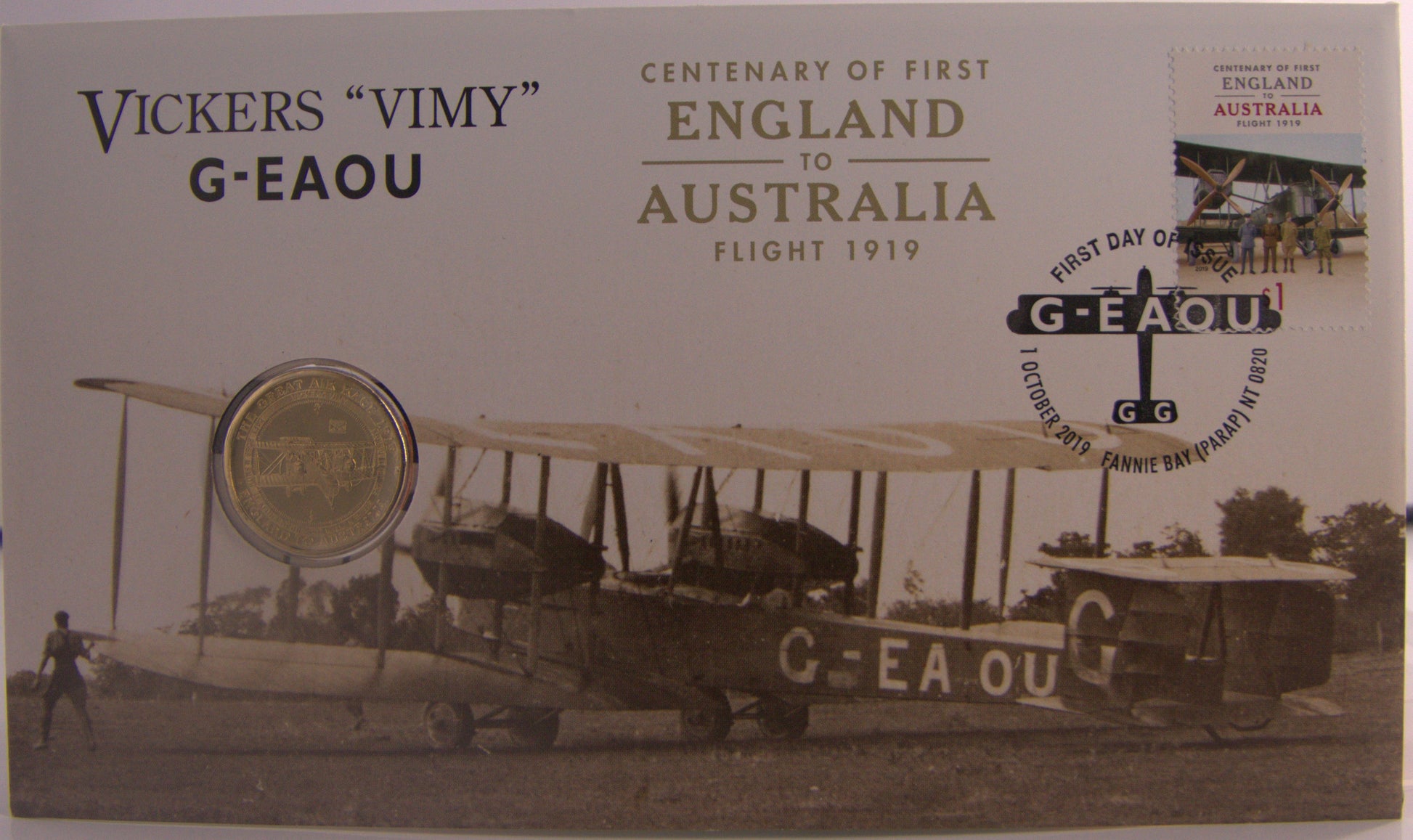 Vickers Vimy airplane and coin, commemorating the first England to Australia flight.