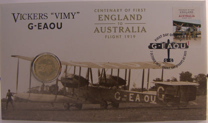 Vickers Vimy airplane and coin, commemorating the first England to Australia flight.