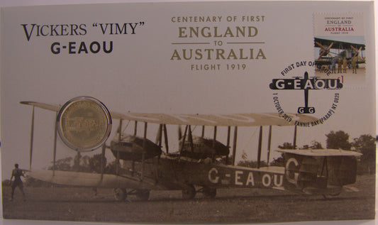 Vickers Vimy airplane and coin, commemorating the first England to Australia flight.