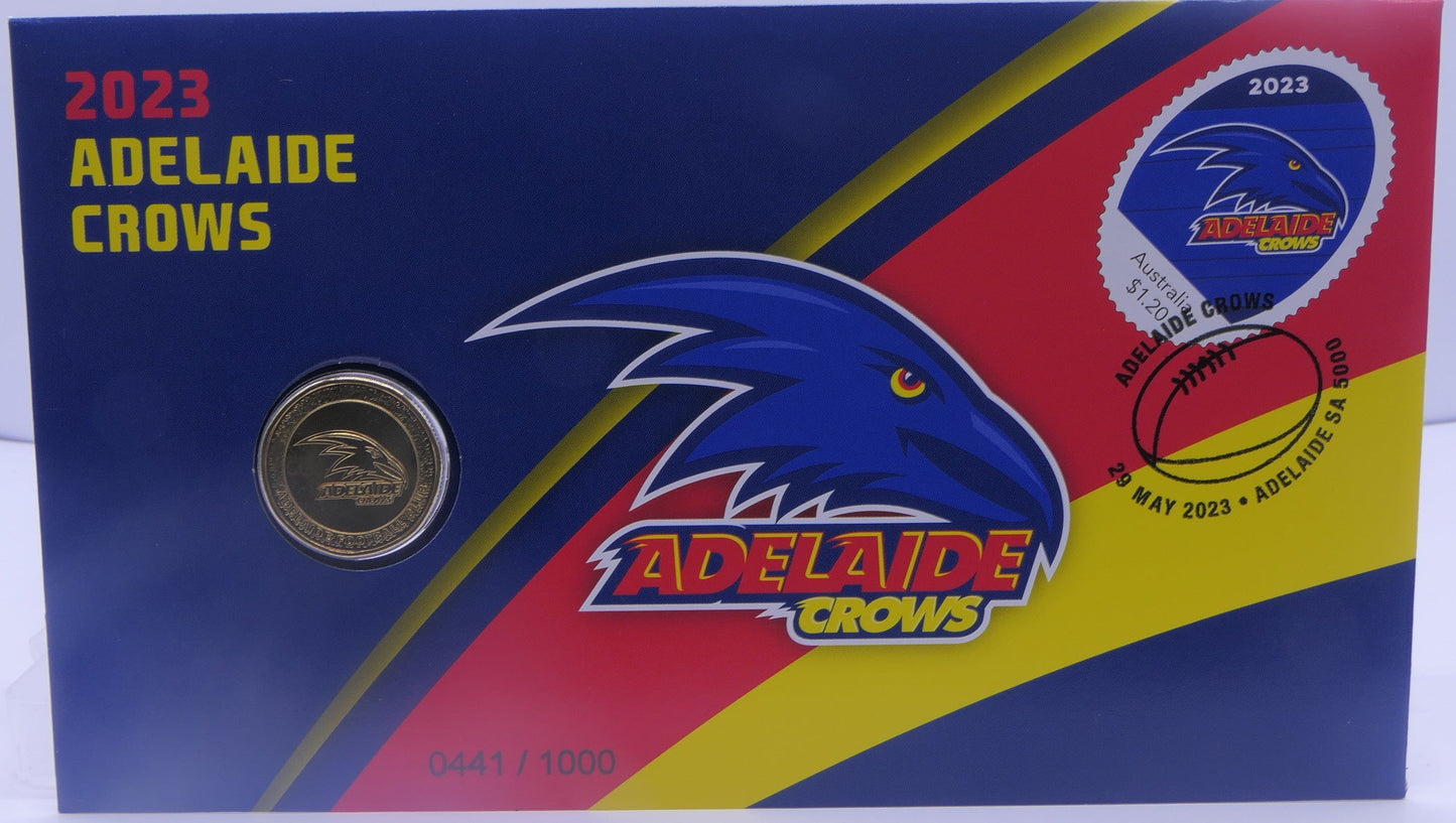 Collectible coin set with Adelaide Crows branding on a blue and red background