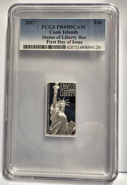 2017 Cook Islands 2 oz Silver Statue of Liberty Bar Coin certified by PCGS as PR69DCAM (Proof 69 Deep Cameo) with a "First Day of Issue" designation.