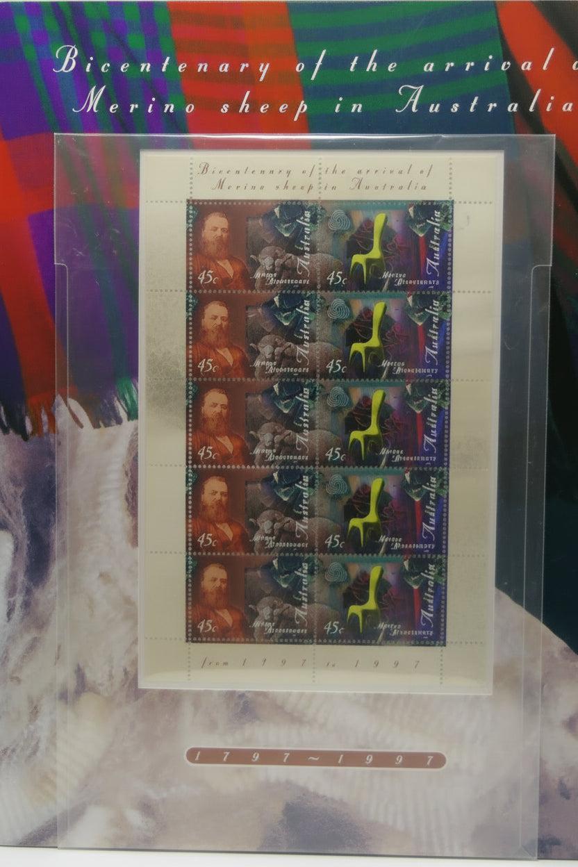 Collection of stamps and a cover with text on a white surface