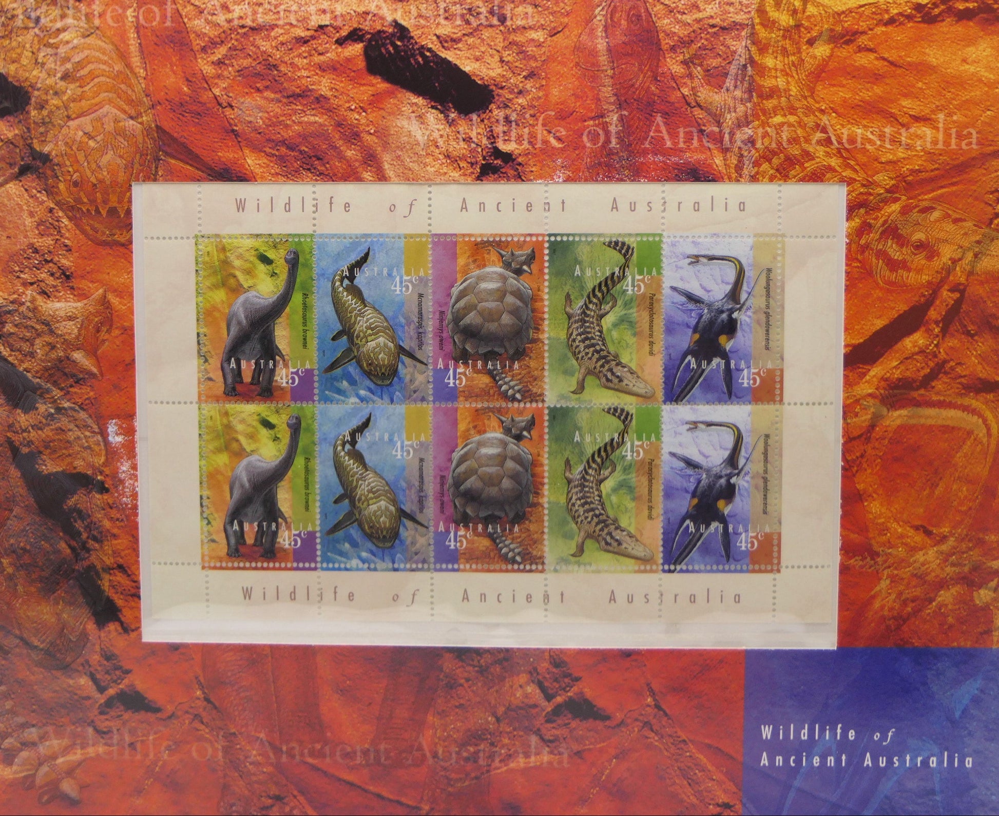 Sheet of stamps featuring animals on a decorative background with 'Wildlife of Ancient Australia' text.