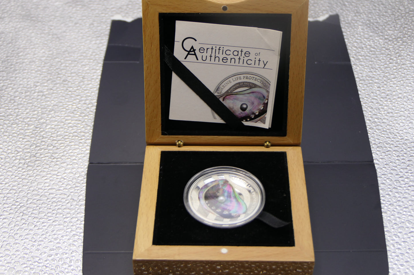 2013 Republic of Palau $5 Marine Life Protection — Pearl Oyster Silver Proof Coin — Real Mother-of-Pearl Insert front