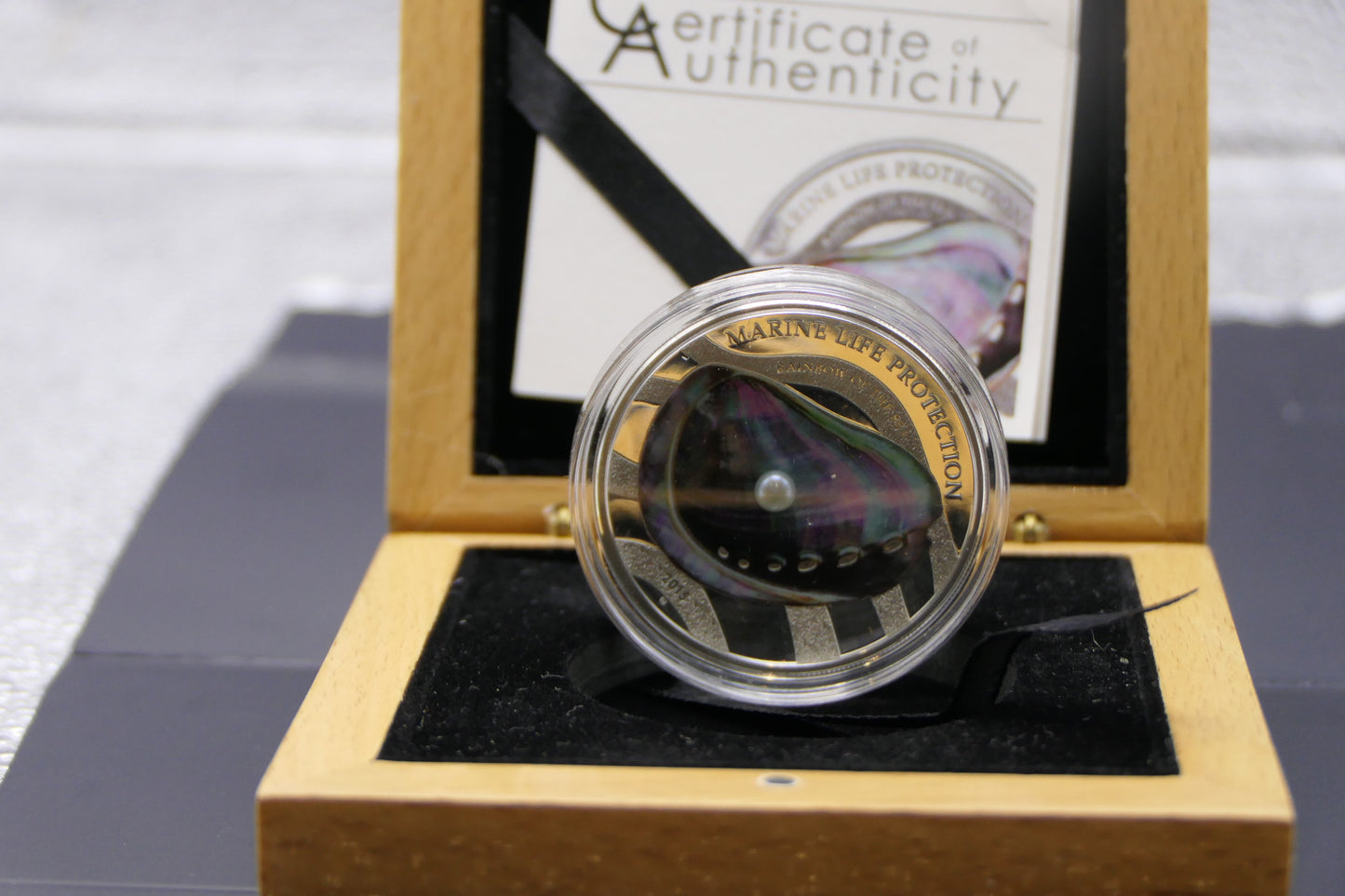 2013 Republic of Palau $5 Marine Life Protection — Pearl Oyster Silver Proof Coin — Real Mother-of-Pearl Insert reverse