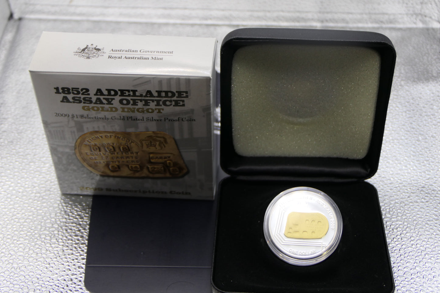2009 $1 Selectively Gold Plated Silver Proof Coin — 1852 Adelaide Assay Office Gold Ingot — Royal Australian Mint front