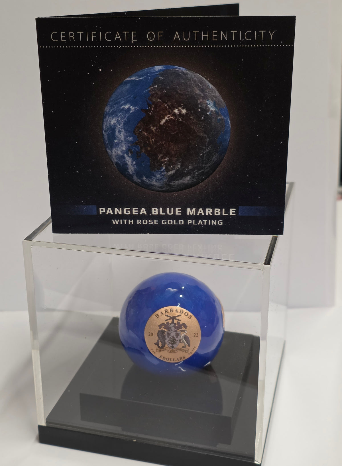 2022 Barbados 5$ Pangea Blue Marble Rose Gold Plated Spherical 3 oz Silver Coin in a display case with its certificate of authenticity