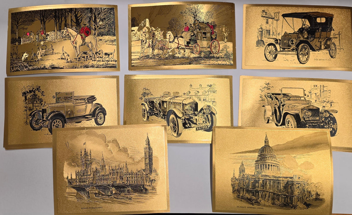 Vintage gold foil art prints, likely by Dufex (FJ Warren Ltd), featuring classic automobiles and London landmarks like the Houses of Parliament and St. Paul's Cathedral.