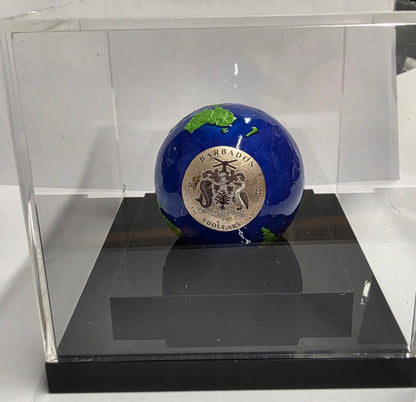 2022 Barbados $5 Blue Marble Planet Earth 3 oz Silver Spherical Coin featuring blue enamel oceans and gold-plated landmasses.