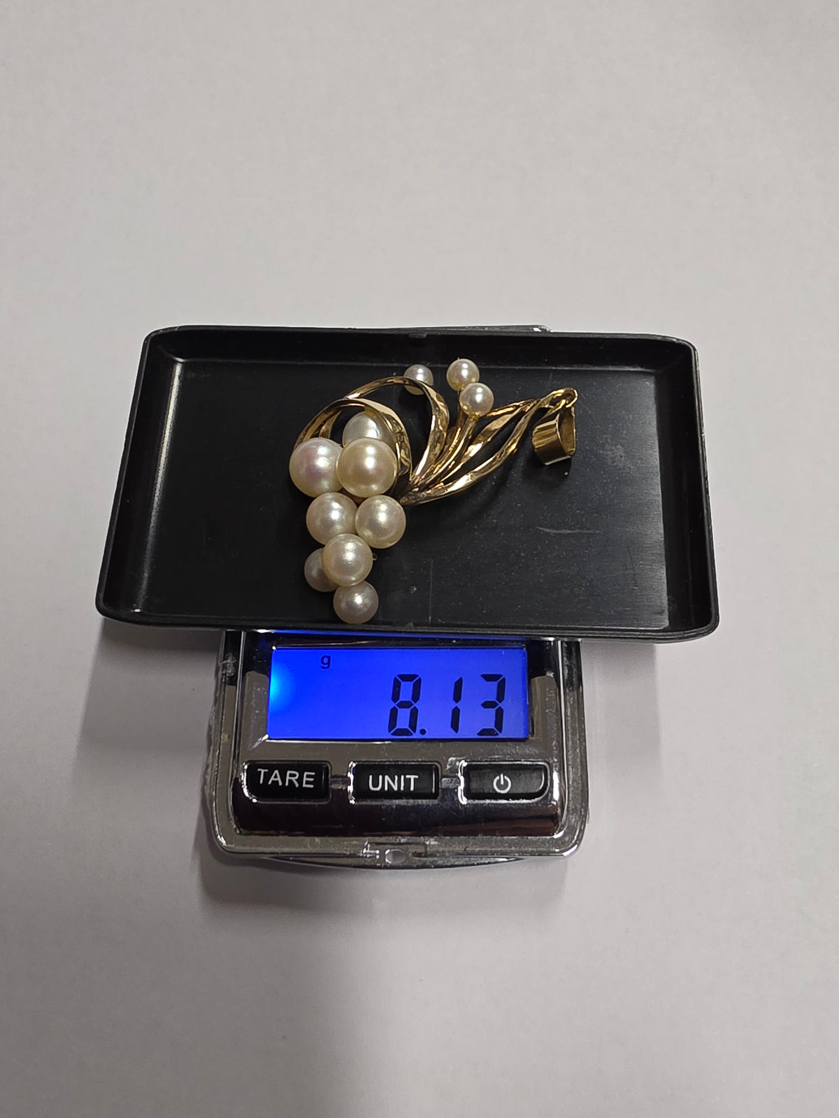 14 ct Vintage Mikimoto Swirl pendant with cultured pearls with 18 ct loop