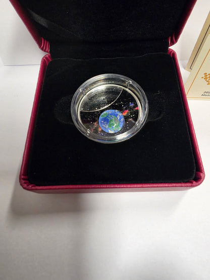 This is a 2020 $20 Fine Silver Coin ("Mother Earth: Our Home") issued by the Royal Canadian Mint