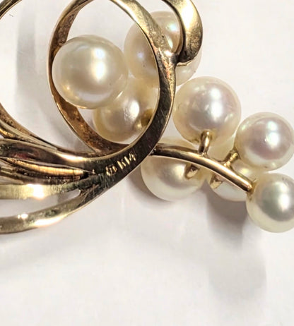14 ct Vintage Mikimoto Swirl pendant with cultured pearls with 18 ct loop
